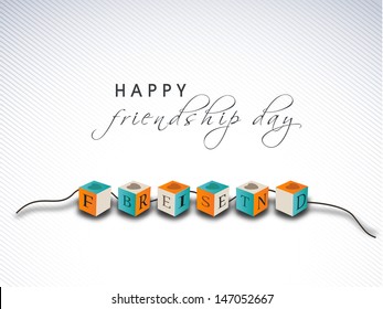 Colorful friendship band on abstract grey background for happy friendship day.