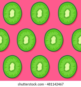 Colorful fruit pattern of fresh kiwi slices on pink background