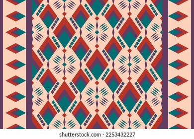 Colorful geometric ethnic seamless pattern designed for background, wallpaper, traditional clothing, carpet, curtain, and home decoration.