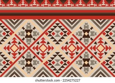 Colorful geometric ethnic seamless pattern designed for background, wallpaper, traditional clothing, carpet, curtain, and home decoration.