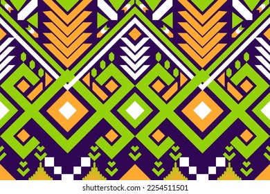 Colorful geometric ethnic seamless pattern designed for background, wallpaper, traditional clothing, carpet, curtain, and home decoration.