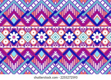 Colorful geometric ethnic seamless pattern designed for background, wallpaper, traditional clothing, carpet, curtain, and home decoration.