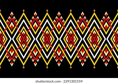 Colorful geometric ethnic seamless pattern designed for background, wallpaper, traditional clothing, carpet, curtain, and home decoration.