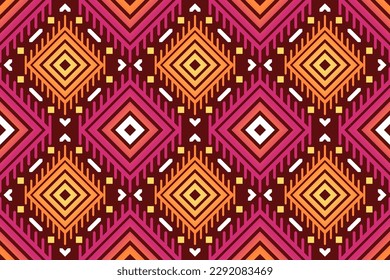 Colorful geometric ethnic seamless pattern designed for background, wallpaper, traditional clothing, carpet, curtain, and home decoration.