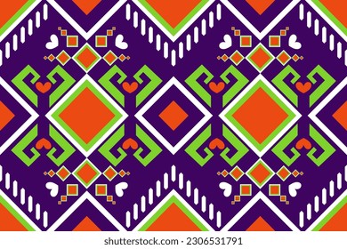 Colorful geometric ethnic seamless pattern, vibrant tribal diamond textile design.