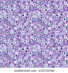 Colorful geometric seamless pattern. Colored circles and rings are chaotically located on bright purple background. Useful as design element for texture and artistic compositions.