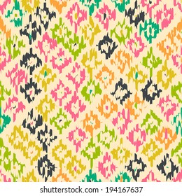 Colorful geometric seamless pattern made in ikat technique. Seamless background can be used for wallpaper, pattern fills, web page background, surface textures.