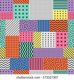 Colorful geometric seamless vector pattern in memphis style