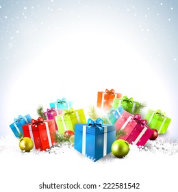 Colorful gift boxes in the snow - Christmas background