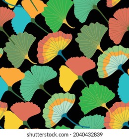 Colorful ginkgo leaves seamless pattern on black background