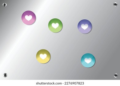 Colorful glass heart magnets on silver pin board background surface with torx screws