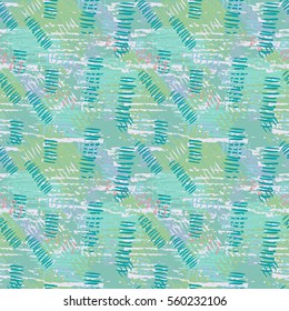 Colorful green, blue grunge seamless pattern with abstract hand drawn brush strokes and paint splashes. Messy infinity texture, modern grungy background. Vector illustration. 