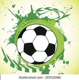 Colorful green splash and ball.Abstract football background