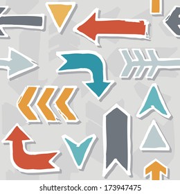 colorful hand drawn different shaped arrow set on gray background seamless pattern