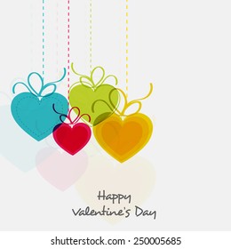 Colorful hanging heart shape balloons for Happy Valentine's Day celebration on white background.