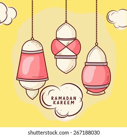 Colorful hanging lanterns on yellow cloudy sky, concept for Islamic holy month of prayers, Ramadan Kareem celebrations. 