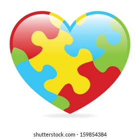 A colorful heart made of symbolic autism puzzle pieces.