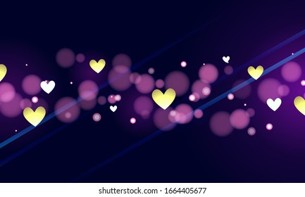 Colorful heart shape bokeh lights on dark background