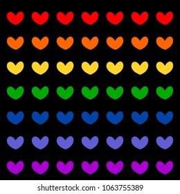 Colorful hearts on black background. LGBT concept. Creative and design concept. Rainbow hearts.