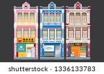 Colorful and historical colonial style three storey shophouses. Isolated. Caption: coffee shop (left), grocery store (right). 