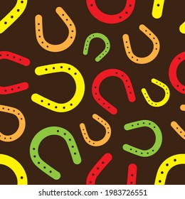 Colorful horseshoe seamless pattern on brown background. Vector illustration.
