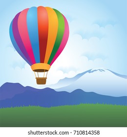 Colorful hot air balloon flying over the mountain