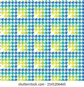 Colorful hounds tooth pattern cloth. Hounds tooth fabric background. Textile design. Multicolor gradient color pattern on white backdrop.