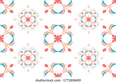 Colorful Ikat ornamentel seamless pattern for textile, wallpaper, card or wrapping paper. Tile for surface design