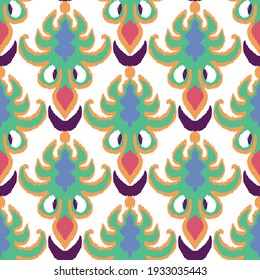Colorful ikat pattern in vintage style. Elegant ethnic background. Hand drawn oriental art. Seamless geometric vintage texture.