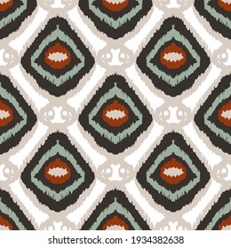 Colorful ikat pattern in vintage style. Elegant ethnic background. Hand drawn oriental art. Seamless geometric modern vintage texture.