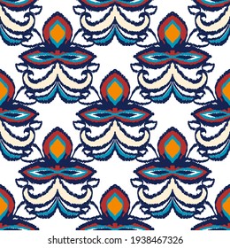 Colorful ikat pattern in vintage style. Elegant ethnic background. Hand drawn oriental art. Seamless geometric modern vintage texture.