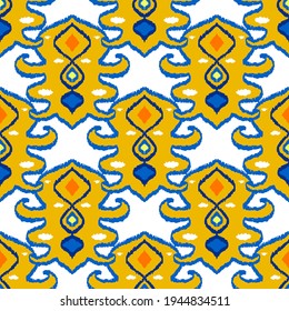 Colorful ikat pattern in vintage style. Elegant ethnic background. Hand drawn oriental art. Seamless geometric modern vintage texture.	