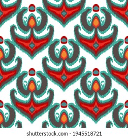 Colorful ikat pattern in vintage style. Elegant ethnic background. Hand drawn oriental art. Seamless geometric modern vintage texture.	