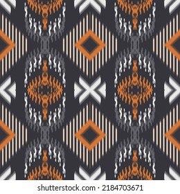 Colorful ikat texture seamless background. Fancy fabric Abstract ethnic ikat chevron pattern background. ,carpet,wallpaper,clothing,wrapping,