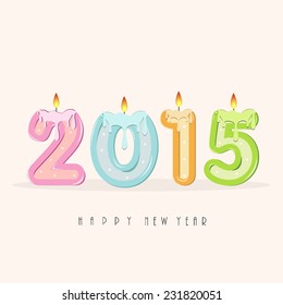 Colorful illuminated candles for Happy New Year 2015 celebrations.