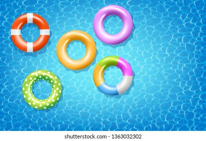 Colorful Inflatable Rings On Blue Water Surface. Vector Photo realistic Illustration. Top View