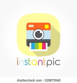 colorful instant camera icon in flat design with a photo layer half printed out like a tongue