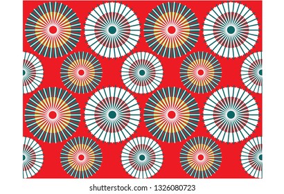 Colorful Japanese parasol on red background
