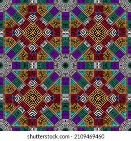 Colorful kaleidoscope vector seamless pattern. Bright ornamental abstract vector background. Greek key meander ornaments. Decorative ornate geometric design. Tribal ethnic style repeat backdrop.