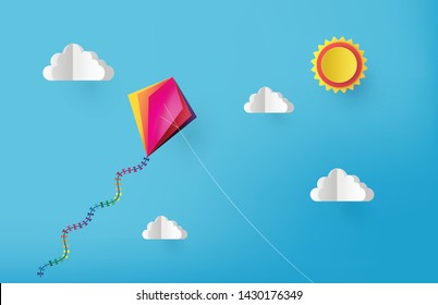 Colorful kite flying on the sky. paper cut  style.