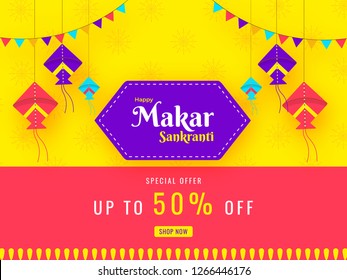 Colorful kites decorated on yellow and pink background with 50% discount for Makar Sankranti festival celebration concept.