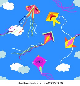 Colorful kites in the sky. Seamless vector pattern with simple colorful design elements. Children textile collection. On blue.
