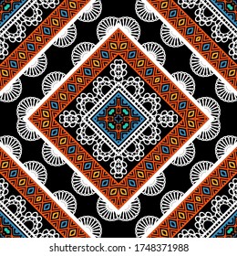 Colorful lace ethnic floral seamless pattern. Vector ornamental background. Abstract tribal repeat backdrop. Geometric folkloric lacy ornament with abstract shapes, rhombus, flowers, stripes, frames.