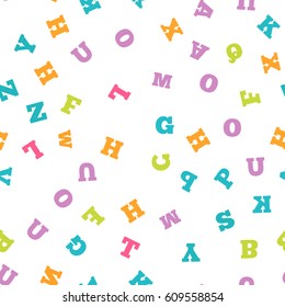 Colorful letter pattern on white background. Vector illustration for education design. Seamless pattern bright color letters random flying. Alphabet book concept for grammar school. Letter wallpaper