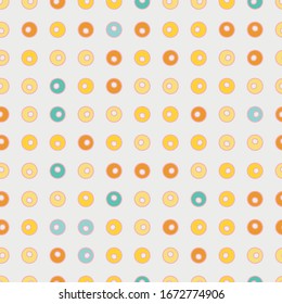 Colorful little doughnuts polka dots seamless vector pattern on a white background. Delicious snack surface print design.Great for fabrics, wrapping paper, menus, gift wrap, packaging, and cards.