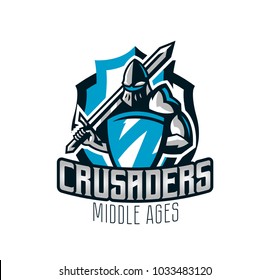 Colorful Logo, Sticker, Emblem Of The Knight In Iron Armor. Knight Of The Middle Ages, Shield, Warrior, Swordsman, Crusader, Defender Of The Fortress. The Mascot Of The Sports Club.Vector Illustration