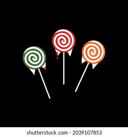 Colorful lollipop isolated on the black background