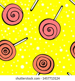 Colorful lollipops on yellow background in flat style design. Seamless background with cute candy.