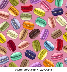 Colorful macaroons Hand drawn seamless pattern. French sweet desserts on pink background.  Can be used for menu, in food industry, for posters