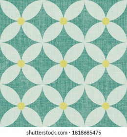 Colorful meadow geometric floral seamless pattern. Repeatable vector background with retro style flat flower shapes in regular rows on green textured background.